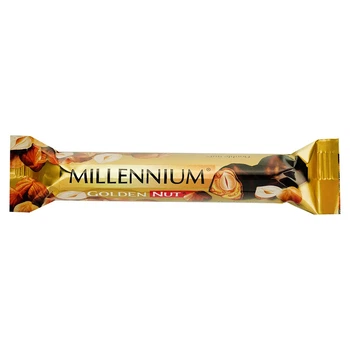 Упаковка шоколаду Millennium Golden Nut чорний з начинкою та цілими лісовими горіхами 40г * 12 шт