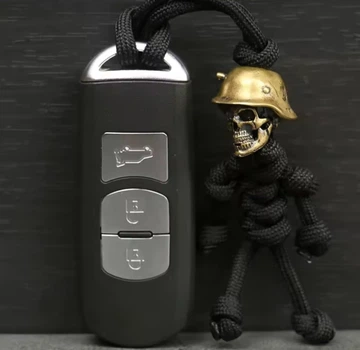 Темляк для ножа мультитула ключей бусина череп солдата брелок черный
