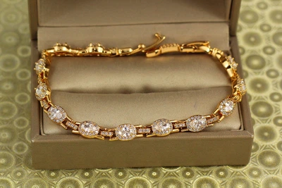 Браслет Xuping Jewelry Мозаика с белыми камнями 17 см 6 мм золотистый
