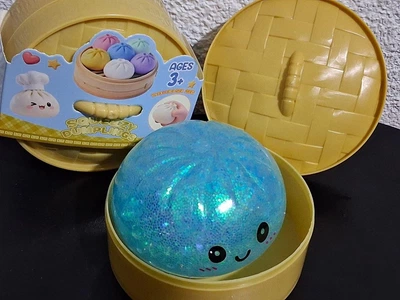 Сквіш Пельмень 10 см у коробочці, іграшка-антистрес Glitter Dumpling усміхнений пельмешка в пароварці
