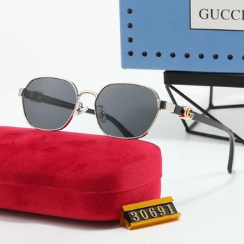 Сонцезахисні окуляри Gucci жіночі сріблясті з сірими лінзами, металеві