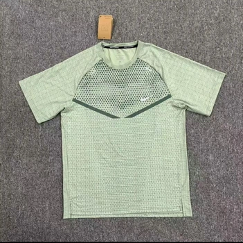 Чоловіча спортивна футболка з принтом Nike зелена XL F77654309