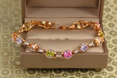 Браслет Xuping Jewelry осколки рассвета с разноцветными камнями 19 см 8 мм золотистый