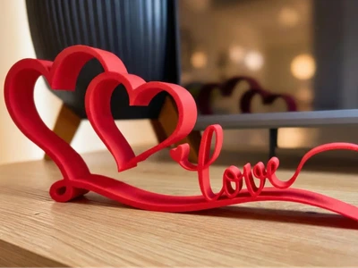 Статуетка два серця та напис love. Aivory