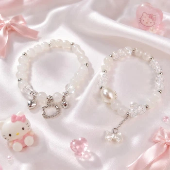 Парні браслети Hello Kitty білі та сріблясті з намистинами 8 мм на резинці, акрил + біжутерний сплав