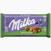 Шоколад Milka з цілим горіхом 95 г.