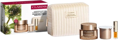 Набір для догляду за обличчям Clarins Extra-Firming Крем для обличчя 50 мл + Змінний блок крему для обличчя 50 мл + Олія для губ 1.4 мл + Косметичка (3666057413650)
