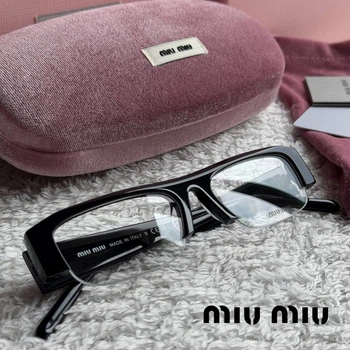 Солнцезащитные очки Miu Miu MU B07S прозрачная линза, черная оправа