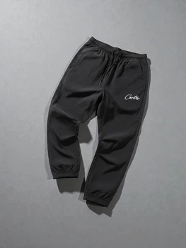 Чоловічі Спортивні Штани Чорні Плащівка Брендові Black L (379087)