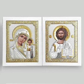 Ікони вінчальні 18,5х23,5 см срібні у білому дереві.