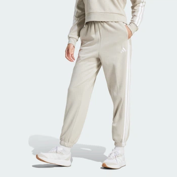 Жіночі джогери Essentials 3-Stripes Fleece Loose-Fit adidas JX7697 (XL) бежевий (4068807273627)