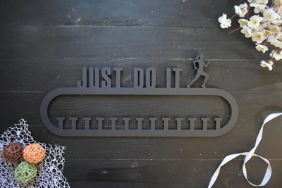 Настенная медальница "JUST DO IT" бег девочка, легкая атлетика, черная, из дерева под заказ (МД0036)