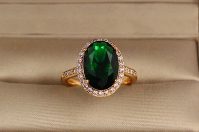 Кольцо Xuping Jewelry малинки с зеленым камнем р 16 золотистое