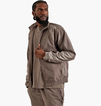 Спортивнаі вітрівка чоловіча Nike Nocta Woven Track Jacket Brown M Коричневий FN7666-040
