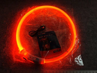 Яскравий світлодіодний LED нашийник для собак та котів 70 см (можна вкорочувати) з USB-заряд. кабель в комплекті. Видимість до 500м в темноті. Колір помаранчевий.