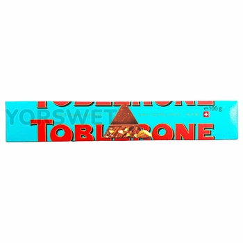 Шоколад Toblerone молочний з солоним карамелізованим мигдалем та медово-мигдальною нугою 100 г (0106)