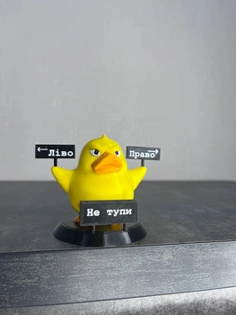 Автомобильная игрушка на панель приборов Утка с табличками Лево/Право (car-864)