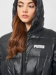 Пуховик зимовий довгий жіночий Puma Adjustable Down Coat 58772901 S Чорний (4063699038767) - зображення 6