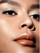 Мерцающий блеск для губ с маслами кокоса и лаванды About Face Light Lock Lip Gloss Payton 4.3 мл - изображение 5