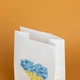 Пакет подарочный с патриотическим принтом eko-kraft 150*90*240 10 шт/уп Крафт пакет с украинской символикой Сердце желто-голубого цвета в цветы Маленький упаковочный пакетик с широким дном - изображение 6
