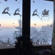 Интерьерная новогодняя наклейка С Новым годом! (санта, олени, город на окно, стекло) глянцевая 1200х200 мм - изображение 1