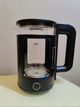 Дисковый электрочайник Rainberg RB-2220 стеклянный с подсветкой 2200W черній - изображение 1