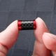 Набор колпачков на ниппель для автомобиля Фольксваген SUNROZ Caps Premium Carbon Red Volkswagen 4 штуки (A-67603) - изображение 3