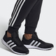 Buty do biegania po asfalcie męskie adidas Retrorunner FV7034 41.5 26 cm Czarne (4062059789899) - obraz 7