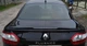 Спойлер LIP (Sunplex, черный) (125,4см*7,2см) для Renault Fluence 2009-2016 гг - изображение 1