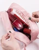 Косметичка водонепроникна органайзер рожева з еко-шкіри Washbag 20х12х 6,5 см сумка для косметики з ручкою - зображення 8