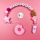 Именной силиконовый грызунок Mommy Bag Пончик розовый - изображение 1