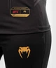 Женская футболка Venum Authentic UFC FightNight Dry Tech Black Gold (VNMUFC-00021-126-XS) - изображение 4
