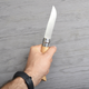 Ніж складний Opinel №10 Inox (довжина: 210мм, лезо: 100мм), бук - изображение 10