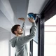 Аккумуляторная эксцентриковая шлифовальная машина Bosch GEX 185-LI с 1 акб 4.0 Ah и зу GAL 18V-40 в кейсе (06013A5021) - изображение 12