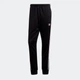 Spodnie dresowe męskie adidas Sst GF 0210 S Czarne (4061612985464) - obraz 4