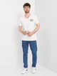 Футболка хлопковая длинная мужская Armani Exchange 11006.3 S Белая - изображение 3