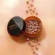 Бронзер у кульках Avon Bronzing Pearls відтінок Помірний(medium bronzer) 28 г - зображення 1