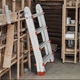 Лестница телескопическая раскладная Intertool 3.99 м алюминиевая универсальная 4 секции по 4 ступени 11.3 кг (000017538) - изображение 9