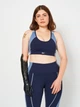Спортивный топ для йоги женский Reebok Reebok Lux Racer Padded Colorblock GS8923 XS Vector Navy (4064057688068) - изображение 1
