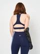 Спортивный топ для йоги женский Reebok Reebok Lux Racer Padded Colorblock GS8923 XS Vector Navy (4064057688068) - изображение 2