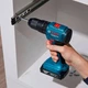 Акумуляторний ударний дриль-шурупокрут Bosch Professional GSB 185-LI з 2 акб GBA 18V 2.0Ah, з/п GAL 18V-20 у кейсі (06019K3100) - зображення 4