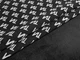 Ткань Вискозный трикотаж на меху надписи, светло-серый на черном, пог. м. (т141, 54101, д2 цв1) - изображение 1