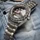 Годинник CITIZEN NB6004-83E - це модель із чорним та сріблястим кольором, призначена для носіння на зап'ястя. - зображення 6