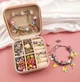 Дитячий набір Rainbow Style Braclet Kit для створення шарм-браслетів та підвісок з 66 предметів в подарунковому боксі, браслети з шармами, Panalisa (74798062) - зображення 2