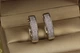 Серьги кольца Хuping Jewelry овальные с камнями три дорожки 2,2 см серебристые - изображение 1