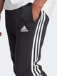 Спортивні штани утеплені чоловічі adidas Fleece 3-Stripes Tapered Cuff IB4030 M Чорні (4066762310050) - зображення 4