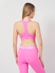 Спортивный топ для фитнеса женский Nike Futura Bra FB4080-675 XS Розовый/Белый (0196976628147) - изображение 8