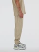 Спортивные штаны мужские New Balance Nb Athletics MP41508SOT XL Песочные (197375356471) - изображение 4