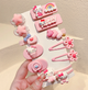 Набор детских мультяшных заколок зажимов для волос для девочки Hello Kitty Хелло Китти 12шт розовый (AN)31429 - изображение 1