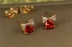 Сережки гвоздики Xuping Jewelry серце з бантиком із червоним каменем 7 мм золотисті - зображення 1